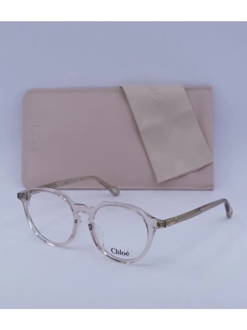 Chloe CH0012OA 001 Round Eyeglasses 50mm - Transparent Pink